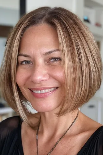 Try on this classic bob cut hairstyle, featuring length above the shoulders and a clean, even trim.