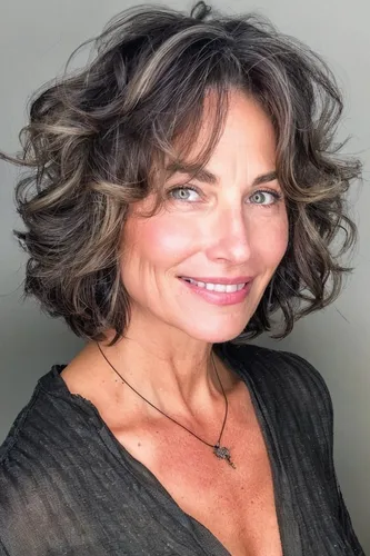 Try on a stylish medium-length, wavy hairstyle