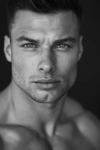 Try on this sharp and neatly styled short hairstyle, portrayed in a high-definition black and white portrait of a man.