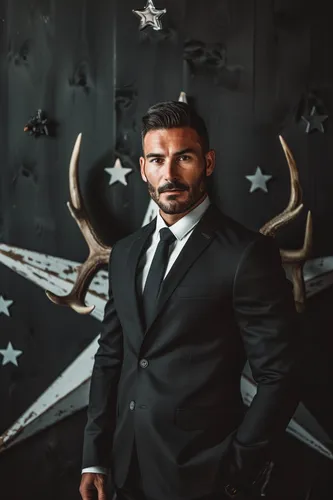 Try on a slicked back hairstyle, short and neatly styled, appropriate for formal events as seen on the man in a suit.