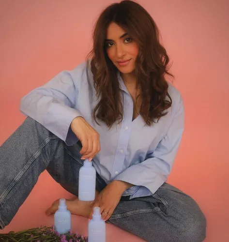 Try on this casual wavy, medium-length hairstyle with soft layers, adding volume and texture subtly.