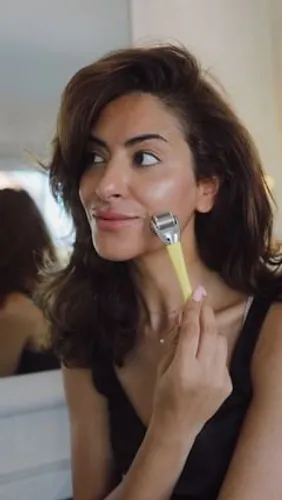 Try on this stylish medium-length wavy hairstyle, showing hair cascading softly around the shoulders. The hairstyle offers a relaxed, effortless look perfect for various occasions.