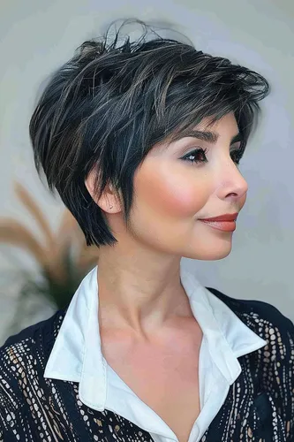 Try on this stylish short layered hairstyle with sweeping bangs that complement a soft, textured look, perfect for showcasing a sophisticated and modern vibe.