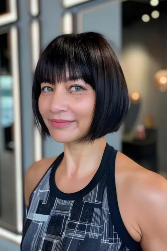 Try on this sleek bob hairstyle in dark color, featuring a smooth texture and even length around.