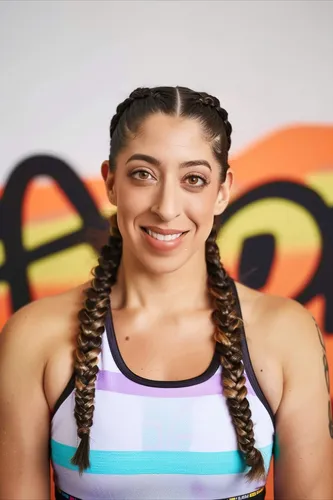 Try on this hairstyle featuring long, neat braids: a pair of tightly woven braids starting from the crown and extending down to the shoulders.