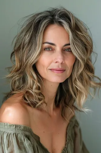 Try on this hairstyle featuring mid-length wavy hair with balayage highlights, soft and natural-looking.