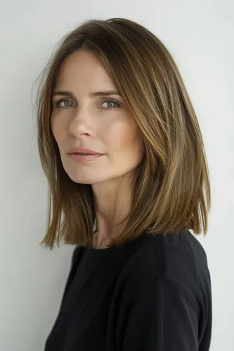 Try on a hairstyle featuring medium-length, straight hair with subtle highlights giving a natural and elegant look.