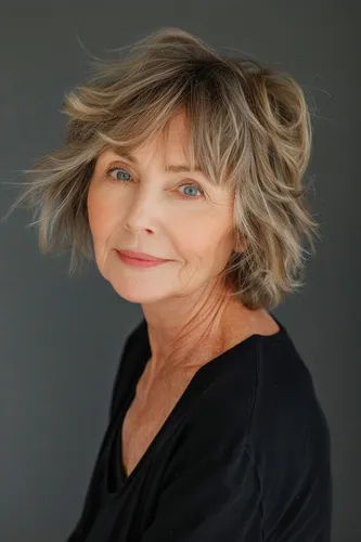 Try on a short and wavy hairstyle featuring voluminous, subtly tousled layers that gracefully frame the face, adding a youthful and dynamic look.