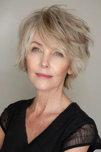 Try on this stylish short, layered hairstyle with feathered ends for a voluminous and modern look