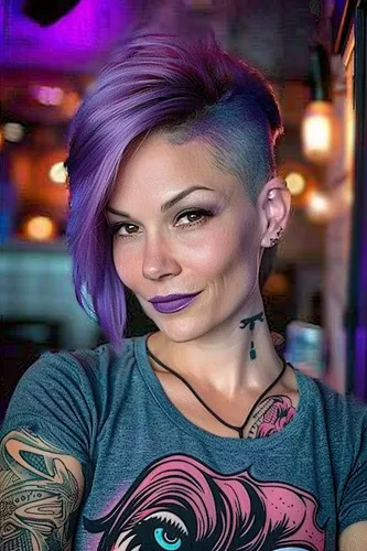 Try on this stylish undercut with vibrant purple tones on semi-shaved hair, offering a modern and edgy look.