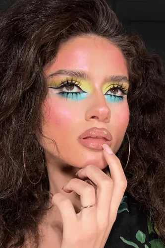 Try on this voluminous curly hairstyle, capturing the fullness and textured allure of thick, curly locks.