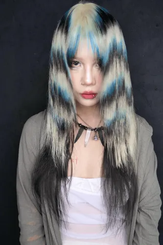 Try on a unique hairstyle featuring long, straight hair with dyed dark, blonde, blue, and teal streaks; the hairstyle is slightly messy adding a striking contrast.