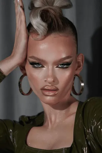 Try on this high bun hairstyle with blonde streaks featuring a sleek and elegant look.