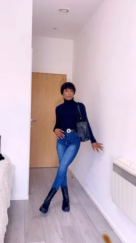 Try on a chic look with short hair styled in a natural, tousled manner, complementing a casual yet fashionable outfit.