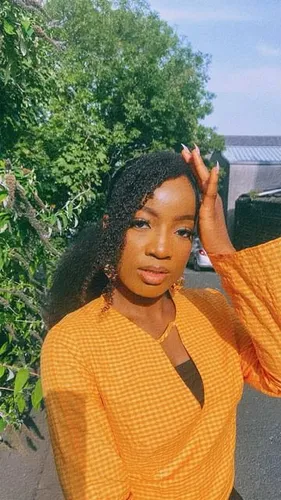 Try on this elegant curly long hairstyle