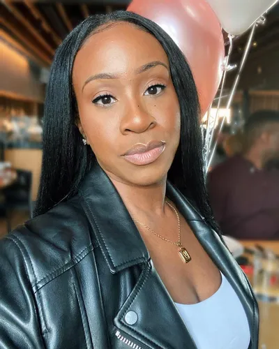 Try on a straight, sleek hairstyle featuring a flat, glossy appearance extending past the shoulders.