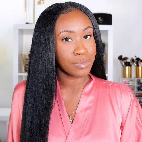 Try on this style featuring long, straight hair cascading down past the shoulders, offering a sleek and elegant appearance.