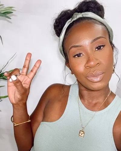 Try on this updo hairstyle with a decorative headband as shown in the image.