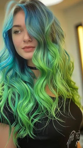 Try on this long, wavy hairstyle featuring a gradient of blue at the roots transitioning into bright green towards the tips.