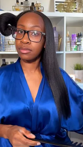 try on this hairstyle featuring straight hair with a unique half-up, half-down style, where one section of hair is tied up high and the rest falls over the shoulders.