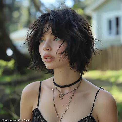 Try on this stylish and edgy short wavy hairstyle that adds a touch of sophistication to your look.