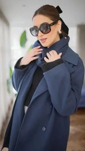 Try on a pulled-back hairstyle with a ribbon accessory