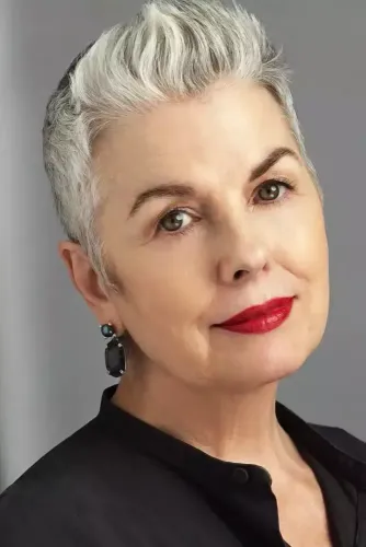 Try on a fashionable short gray hairstyle with a subtle blend of lighter and darker tones.