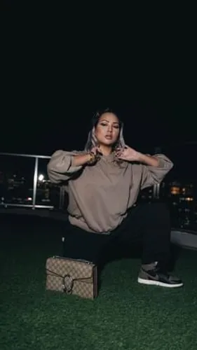 Try on this medium-length straight hairstyle for a sleek and fashionable look