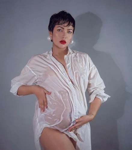 Try on a short hairstyle with a modern and elegant look.