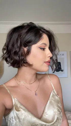 Try on this short wavy hairstyle