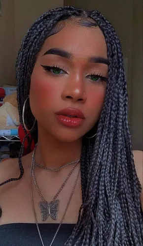 Try on this style of densely packed, fine braids hanging over the shoulders.