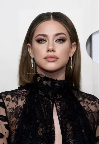 Try on this sleek center-parted straight hairstyle.