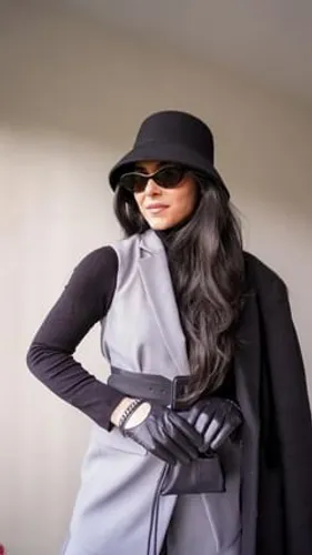 try on this elegant style featuring long, straight black hair under a stylish hat, enhancing a sophisticated look