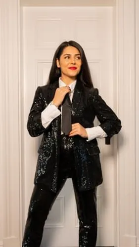 Try on this long straight hairstyle, featuring dark, sleek hair that falls well past the shoulders.