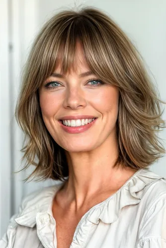 Try on this shaggy bob hairstyle complemented with light bangs, which provide a playful yet sophisticated look.