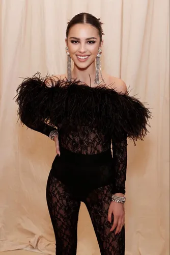 try on a sleek hairstyle, featuring a neat, tightly pulled back look characteristic of elegance and simplicity.