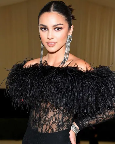 Try on this sleek ponytail hairstyle, characterized by its smooth texture and tightly pulled back hair that accentuates the facial features.