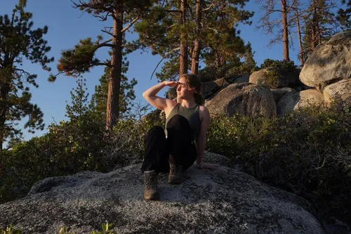 Try on this curly, medium-length hairstyle perfect for an outdoor adventure