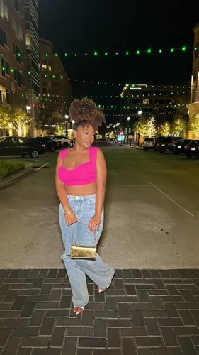 Try on a voluminous curly updo hairstyle.