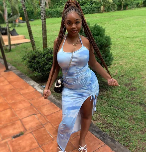 Try on this braided hairstyle with small, side-parted twists that extend to a medium length.