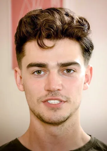 Try on a wavy, voluminous hairstyle that features ample volume on top with shorter sides.