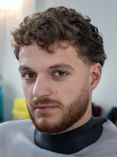 Try on a short curly hairstyle.