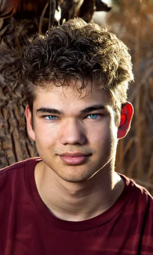 Try on this short, curly hairstyle that features voluminous curls adding texture and depth.