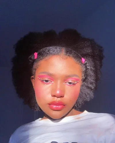 try on, afro hairstyle with a natural voluminous texture