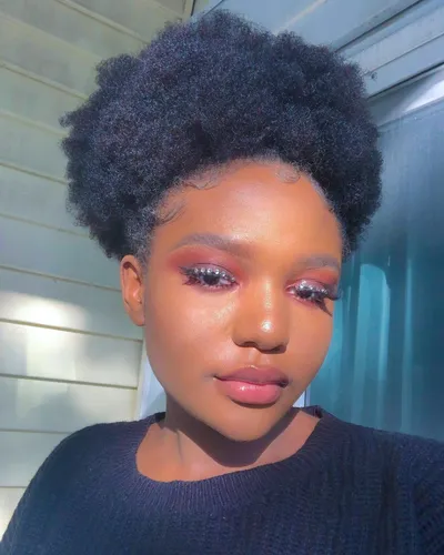 try on a dense, voluminous afro hairstyle