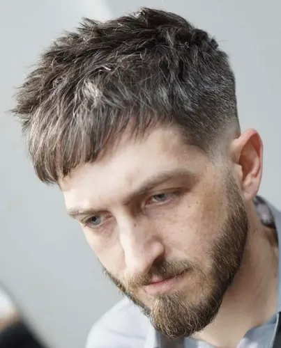 Medium-length male balayage hairstyle showcasing a unique blend of sun-kissed hues, perfect for casual outings or trendy events.