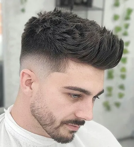 try on a trendy hairstyle featuring a textured top and a fade.