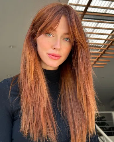 try on long auburn hair with a fringe, styled straight and flowing over the shoulders