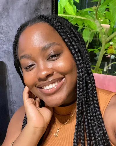 Try on a hairstyle featuring medium-length braids, offering a neat and stylish look.