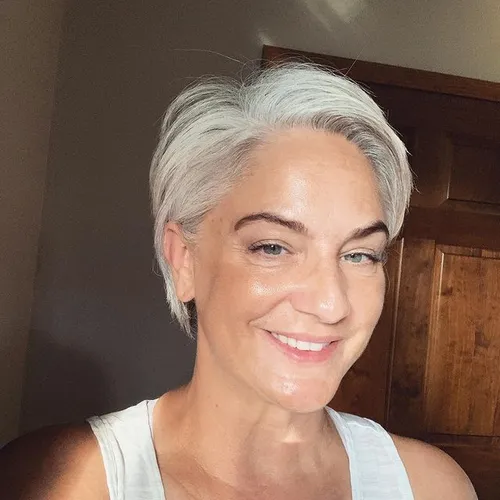 Try on a white short hairstyle featuring a neatly styled look.